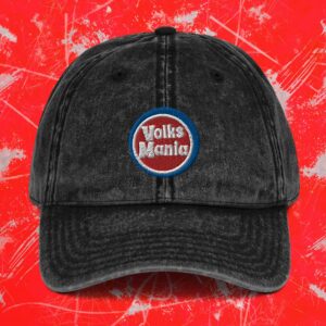 Vintage style black cotton twill cap with VolksMania logo on front.